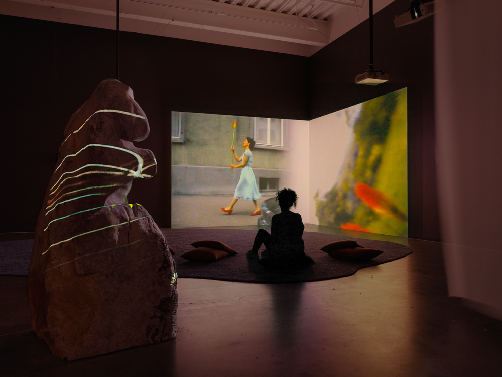 Pipilotti Rist, Ever Is Over All, 1997. Two-channel video and sound installation, color; 4:07 min. Dimensions variable. Sound by Anders Guggisberg and Rist. Courtesy the artist, Hauser & Wirth, and Luhring Augustine. Installation photo: Maris Hutchinson / EPW Studio, courtesy New Museum. 