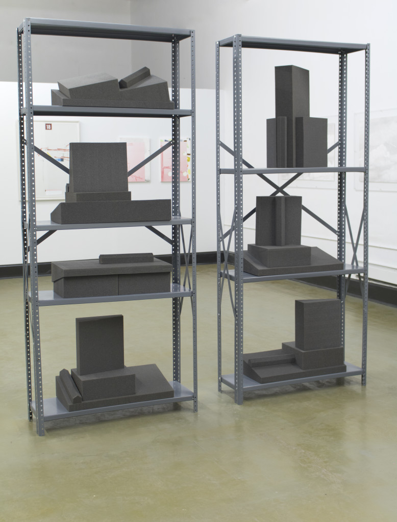 Jeff Prokash, Architectural Models / Foam Book Supports (Future Sites), Charcoal CV 1235 Medium 1200 Series Polyurethane Foam; February 20, 2017, 7 sets, 24 in x 12 in x 6 in (dimensions variable); Industrial Shelving; painted steel, zinc plated steel hardware, 2 sets 2 in x 36 in x 86 in, courtesy Phil Peters